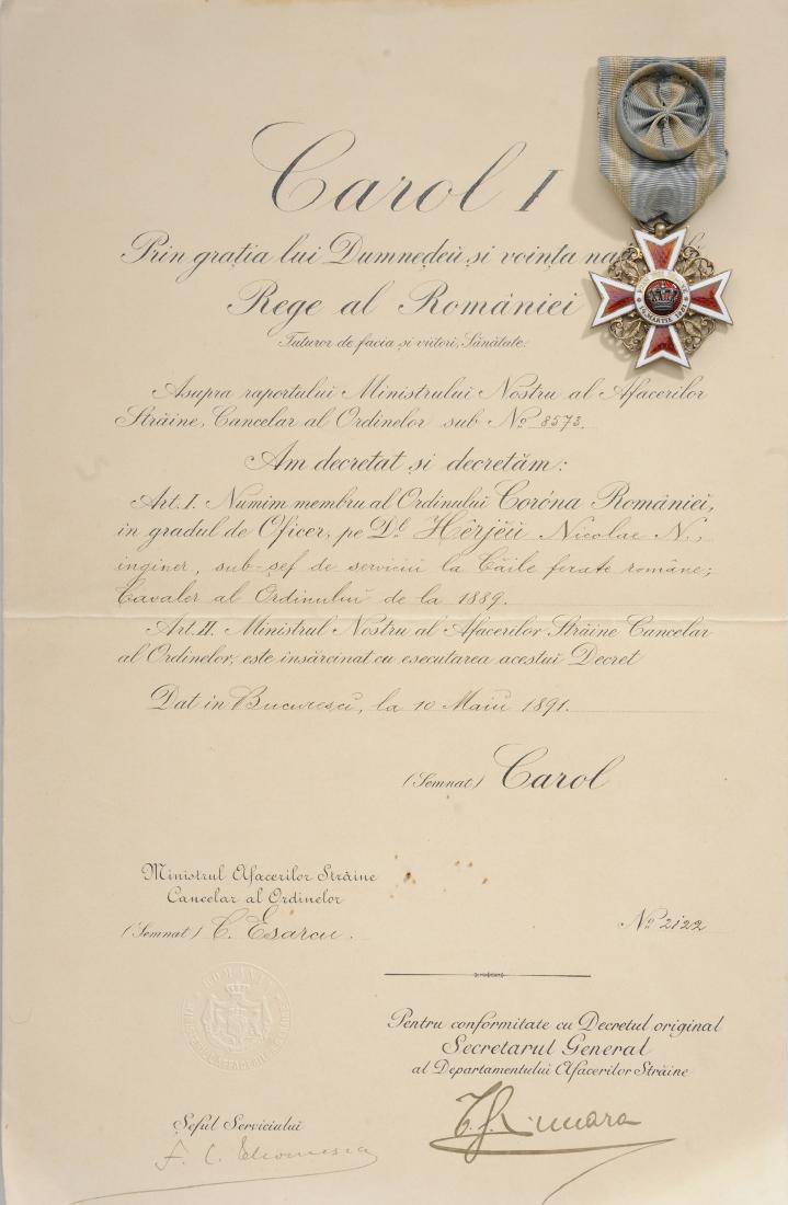 ORDER OF THE CROWN OF ROMANIA, to a Romanian Railway: Officer 's Cross, 1st Model, Civil. Breast Badge, 40 mm, Silver gilt, both sides enameled, original ring and ribbon with rosette, together with awarding document, dated 10.05.1891. I