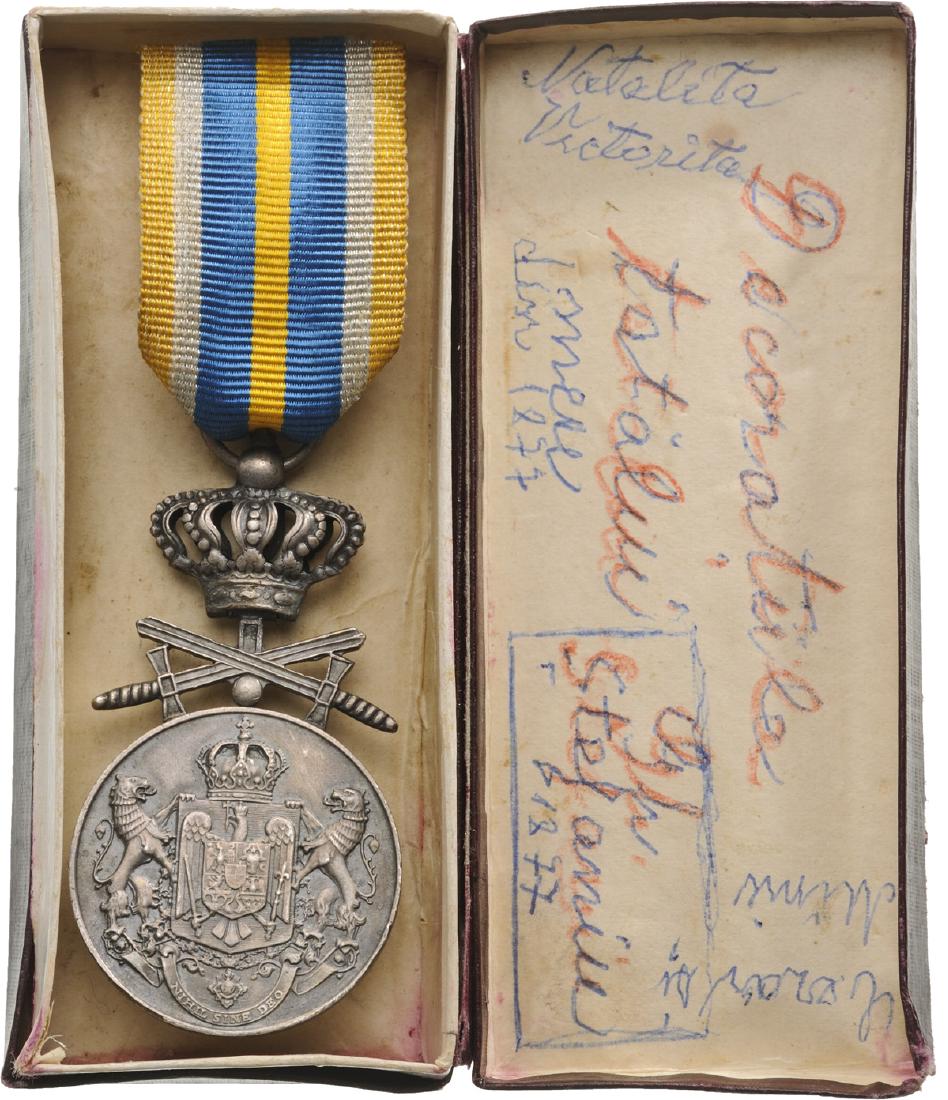 Medal of Faithfull Service, 2nd Type, 2nd Class,: Breast Badge, 66x32 mm, silvered Bronze , original crown and swords suspension ring and ribbon, in rare cardboard case of issue with monogram of King carol II. I R!