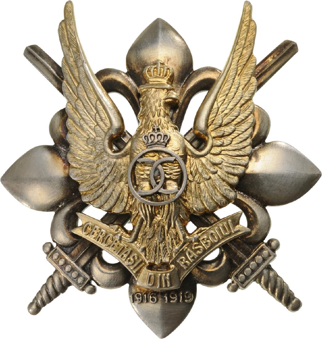 WAR BADGE OF THE SCOUTS, 1935 MODEL: 1st Model, King Carol II. Breast Badge, 57x52 mm, partially gilt Silver, hallmarked "900", maker's mark "KK", with pin on reverse, I.M.S.P.R. 755. I