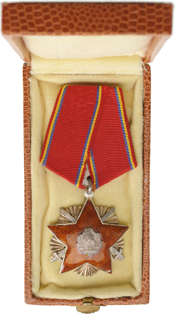 RPR - ORDER FOR DEFENCE OF THE FATHERLAND, instituted: 3rd Class, 1st Model. Breast Badge, 46 mm, Silver partially gilt, original suspension ring and triangular ribbon, in rare original case of issue. Awarded to the military and civilian persons distingui
