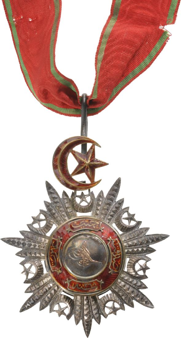 ORDER OF MEDJIDIE: Commanderâ€™s Cross, 3rd Class, instituted in 1852. Neck Badge, 79x66 mm, Silver with brilliant cut rays, central medallion gilt, enameled, Ottoman hallmark on reverse, original star 