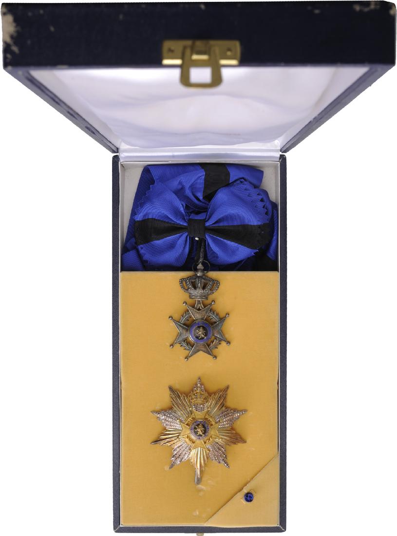 ORDER OF LEOPOLD II: Grand Cross Set, 1st Class, instituted in 1900. Sash Badge, 85x53 mm, Silver, hallmarked, one side enameled, original suspension ring and long sash. Breast Star, 89 mm, Silver, with faceted and pierce