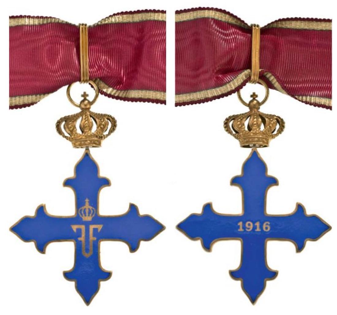 ORDER OF MICHAEL THE BRAVE, 1916: Commander Cross, 2nd Class, 1st Model in silver gilt, both sides blue enameled, obverse with Ferdinand Ist cipher, reverse with “1916”, with original suspension loop and original ribbon. Extremely