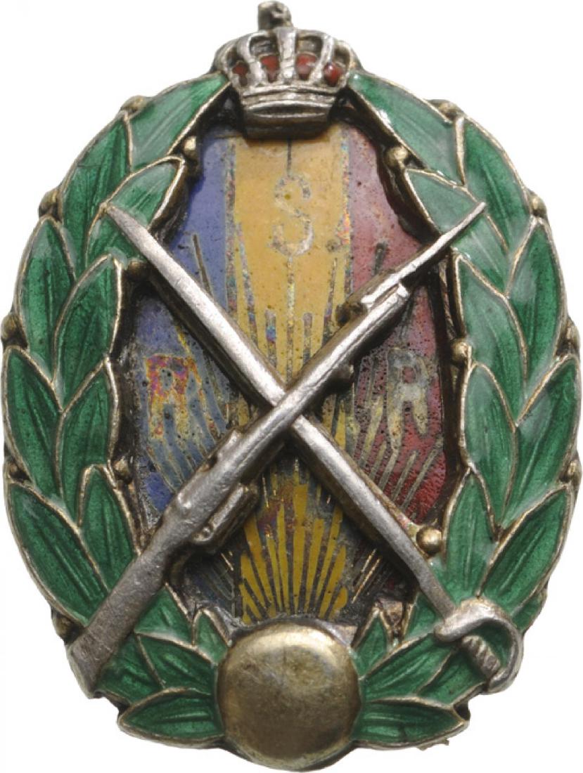 Badge of the "Reserve and Retired Petty Officers",: ROMANIA, Model featuring the letters SRR, Breast Badge, 20x14 mm, Silver, hallmaked "900 and crown", enameled, screw on the back. M.S.B.R. 073. Very rare! I RR!