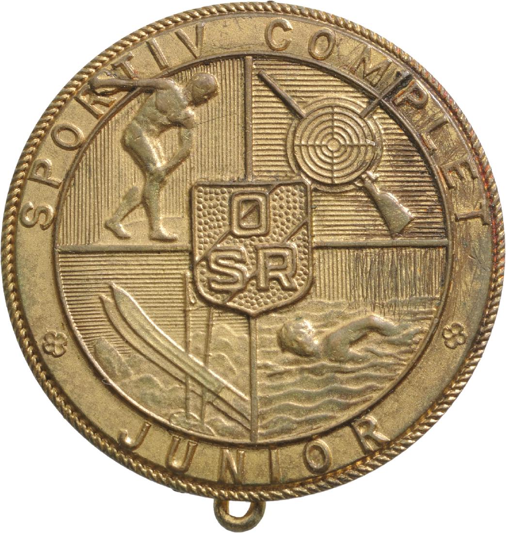 Romanian Sportsman Badge (Complete Sportsman) -: ROMANIA, Breast Badge, 29 mm, gilt Bronze, maker's mark "Monetaria Nationala", vertical pin on the back. M.S.B.R 714. I-