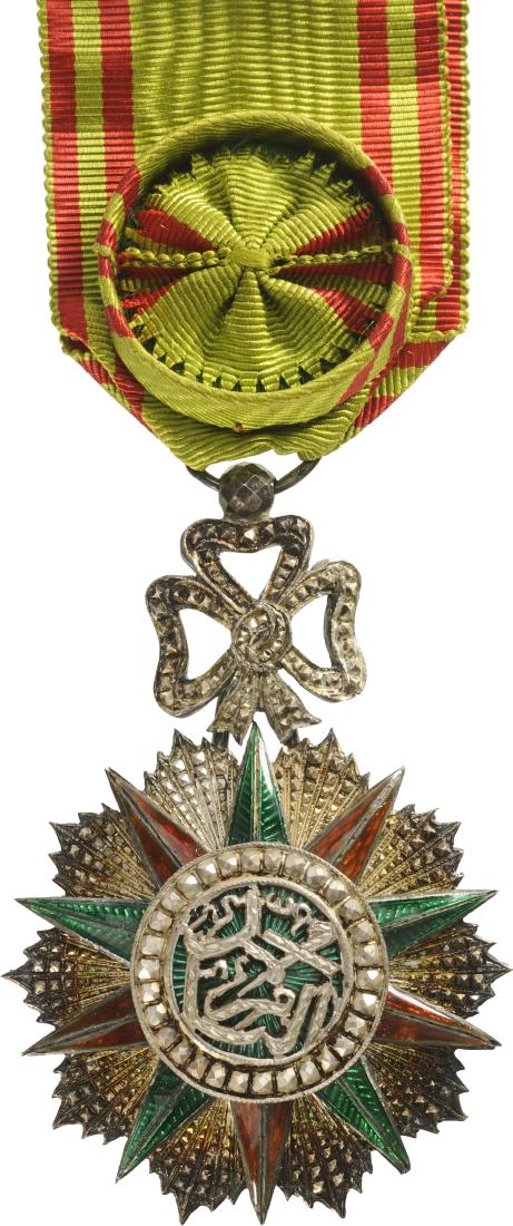ORDER OF NICHAN AL IFTIKHAR: TUNISIA, Officer`s Cross, 4th Class, Mohamed es Sadok Bey (1859 - 1882). Breast Badge, 65x42 mm, Silver with brilliant cut rays, hallmarked, enameled, central medallion silver, enameled, original orna