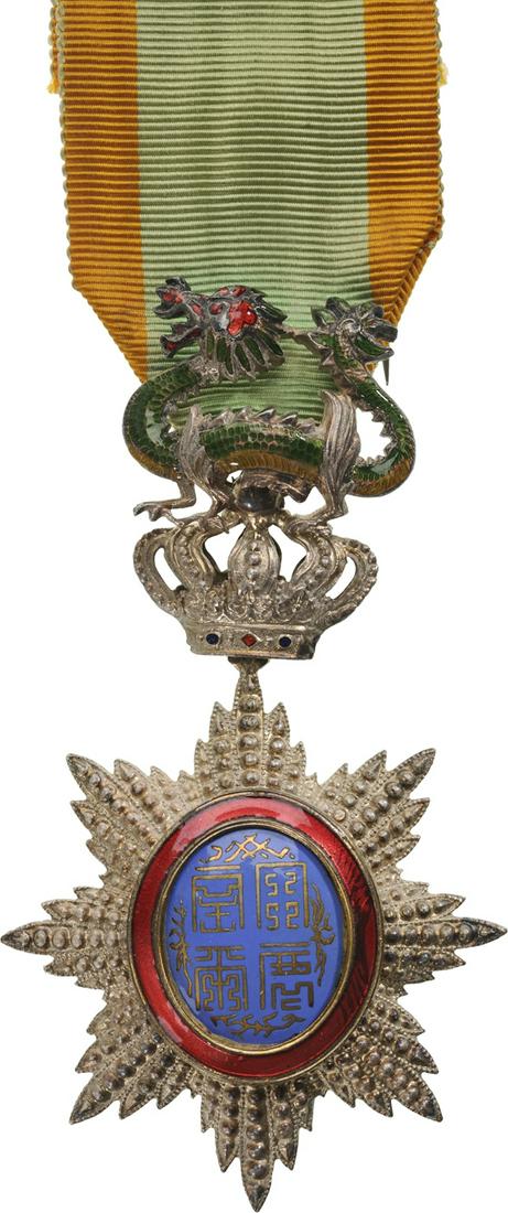 ORDER OF THE DRAGON OF ANNAM: Knight's Cross, 5th Class, instituted in 1886. Breast Badge, 89x50 mm, Silver, brilliant cut rays, central medallion silver enameled, original suspension device, ring and ribbon. Very attractive order