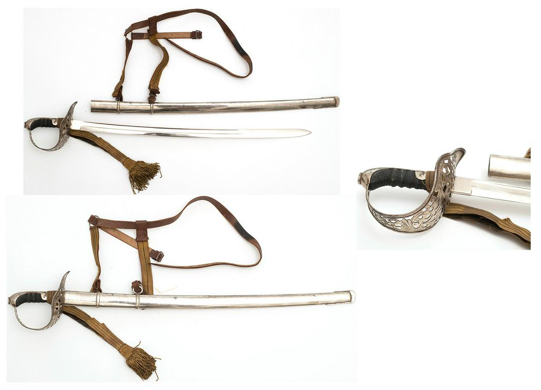 Imperial Austro-Hungarian cavalry officer sword with: Steel blade, wire bound Shark Skin grip. Nickel-plated guard very ornate with floral motifs. Nickel-plated scabbard. Sword knot with open fringes made in gold wire. Hangers made in leather with gold w