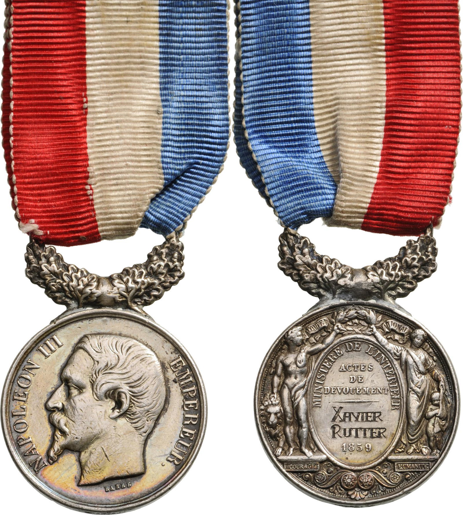 Napoleon III, 2nd Empire, (1852-1870): Ministry of the Interior Honor Medal for Heroic Deeds and Dedication (signed Barre). Breast Badge, 41x27 mm, Silver, original suspension ring and ribbon, named to "Xavier Rutter, 1859". Interesting an