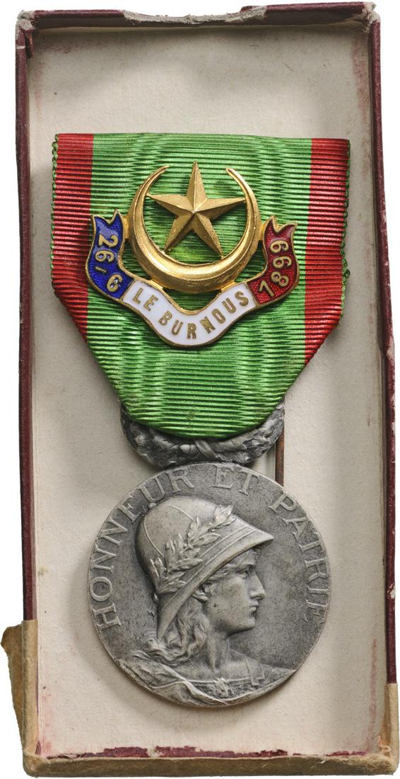 Badge of the Philantropic Society of the Ancient: Breast Badge, 35x31 mm, silvered Bronze, original suspension ring and ribbon with enameled motto and gilt star, in case. Very attractive and scarce! le (Paris, 1987), p. 66, no. 3. R! I Country: FRANC