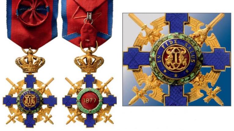 ORDER OF THE STAR OF ROMANIA, 1864: Officer 's Cross, 2nd Model (1932), for Military in Time of War. Breast Badge, Bronze gilt, both sides enameled, original suspension ring and ribbon with rosette. IÂ Country: ROMANIA