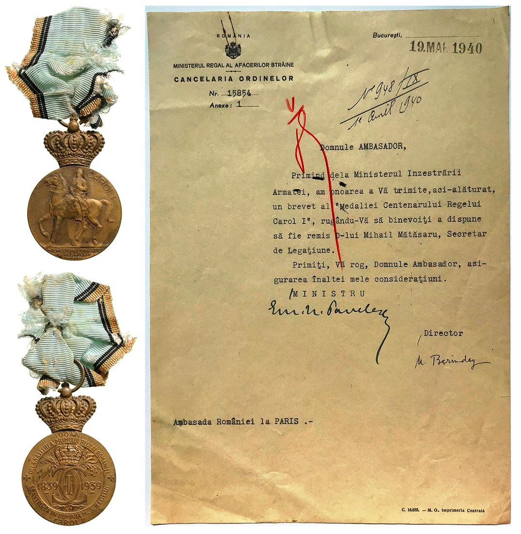 The Centennial Medal, instituted on 5th of May, 1939: To a Secretary of the Romanian Embassy in Paris. Breast Badge, 47x35 mm, Bronze, on obverse the King on horseback, on reverse the years "1839-1939", with original ring and ribbon, for the celebration 