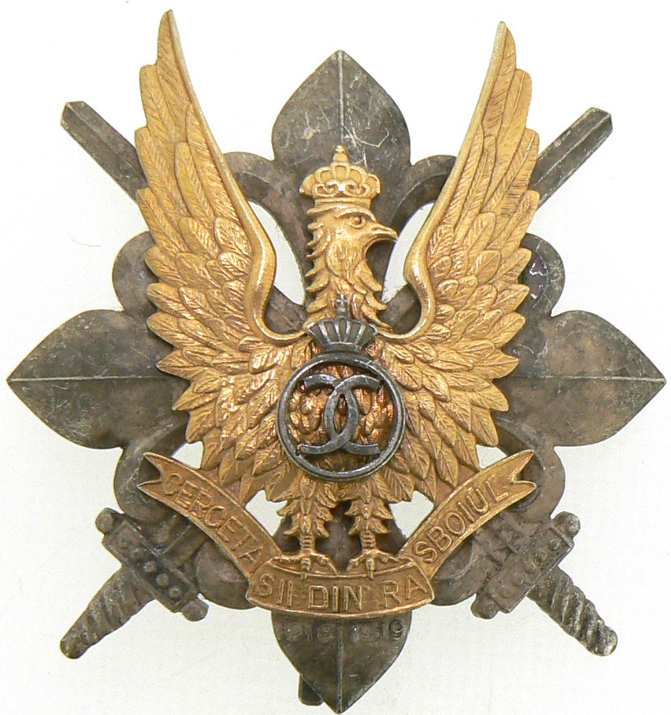 WAR BADGE OF THE SCOUTS, 1935 MODEL: 1st Model, King Carol II. Breast Badge, 58x52 mm, partially gilt Silver, maker's mark "CERBU", numbered 90, with pin on reverse, I.M.S.P.R. 756. IÂ Country: ROMANIA