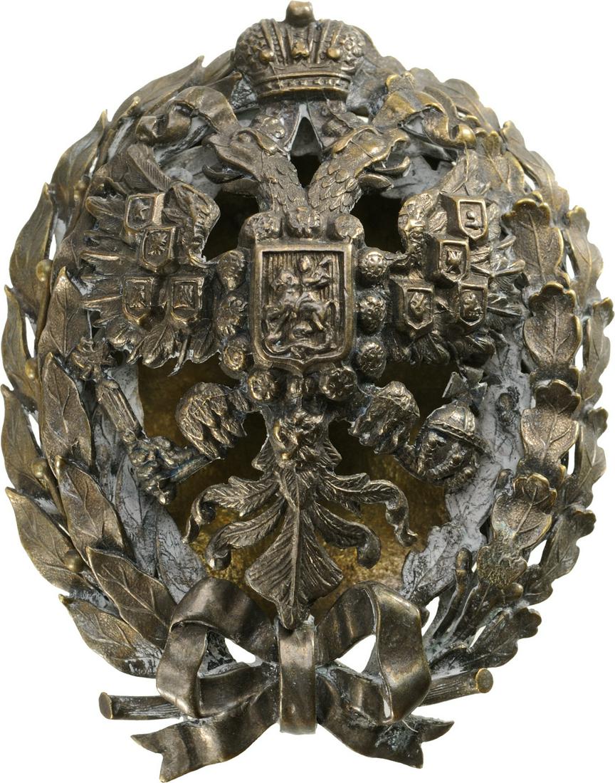 Imperial Nicholas Military Academy Badge: Breast Badge, 56x45 mm, silvered Bronze, superimposed part silvered, original Bronze screw, nut and plate. I- Country: RUSSIA