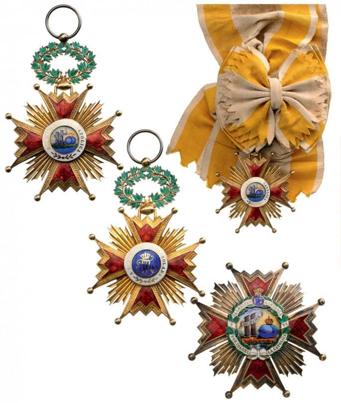 ORDER OF ISABELLA THE CATHOLIC: Grand Cross Set, 1st Class, instituted in 1815. Sash Badge, 64 mm, gilt Silver, enameled, both central medallions gold enameled, with original laurel crown suspension device and full sash (with some s