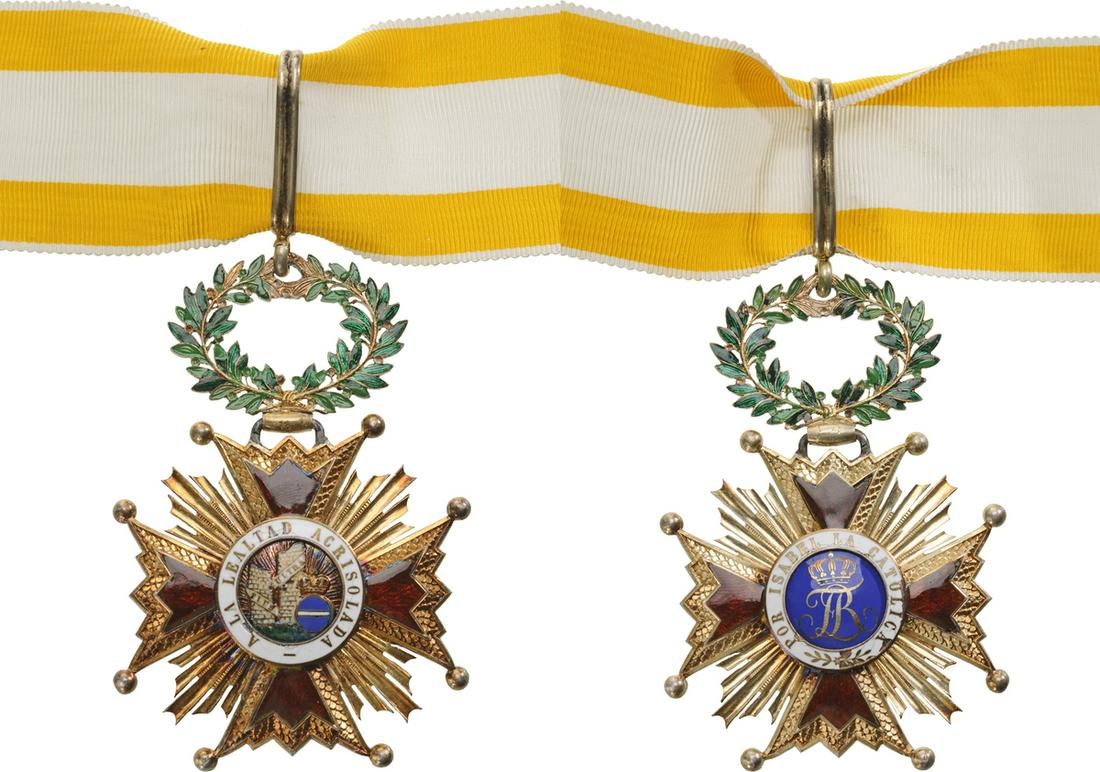 ORDER OF ISABELLA THE CATHOLIC: Commander's Cross, instituted in 1815. Neck Badge, 74x51 mm, gilt Silver, enameled, central medallion gilt silver, enameled, original suspension wreath, loop and complete ribbon. II Country: SPAIN