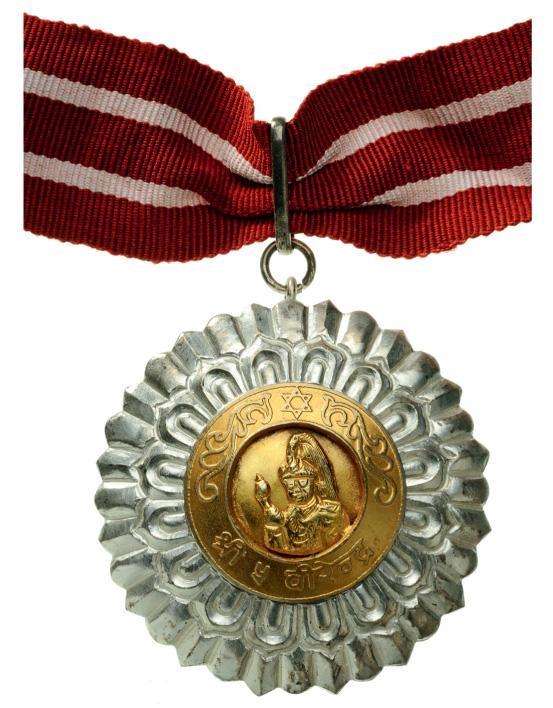 BIRENDRA ORDER FOR DEMOCRACY: Commander`s Cross. Neck Badge, Silver, 65 mm, superimposed central medallion gilt silver, original suspension ring and ribbon. I Country: NEPAL