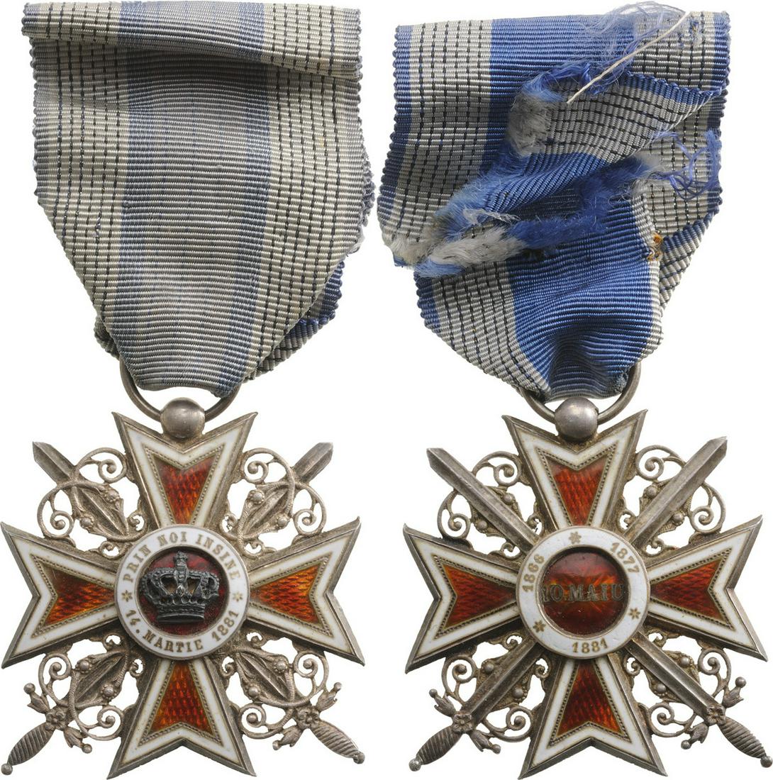 ORDER OF THE CROWN OF ROMANIA: Knight 's Cross, 1st Model, Miltary. Breast Badge, 41 mm, Silver, both sides enameled, original ring and ribbon, in original case of issue by "Lemaitre, Paris" with cypher of King Ferdinand on the lid