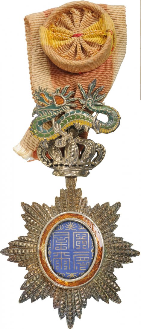 ORDER OF THE DRAGON OF ANNAM: Officer's Cross, 4th Class, instituted in 1886. Breast Badge, 85x49 mm, Silver gilt, brilliant cut rays, central medallion silver enameled, original suspension device, ring and ribbon with rosette. Ve