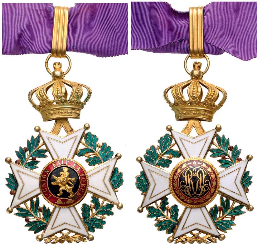 ORDER OF LEOPOLD: Commander`s Cross, 3rd Class, instituted in 1832. Neck Badge, 59 mm, gilt Silver, both central medallions gilt, both sides enameled, original suspension loop and neck ribbon. II Country: BELGIUM