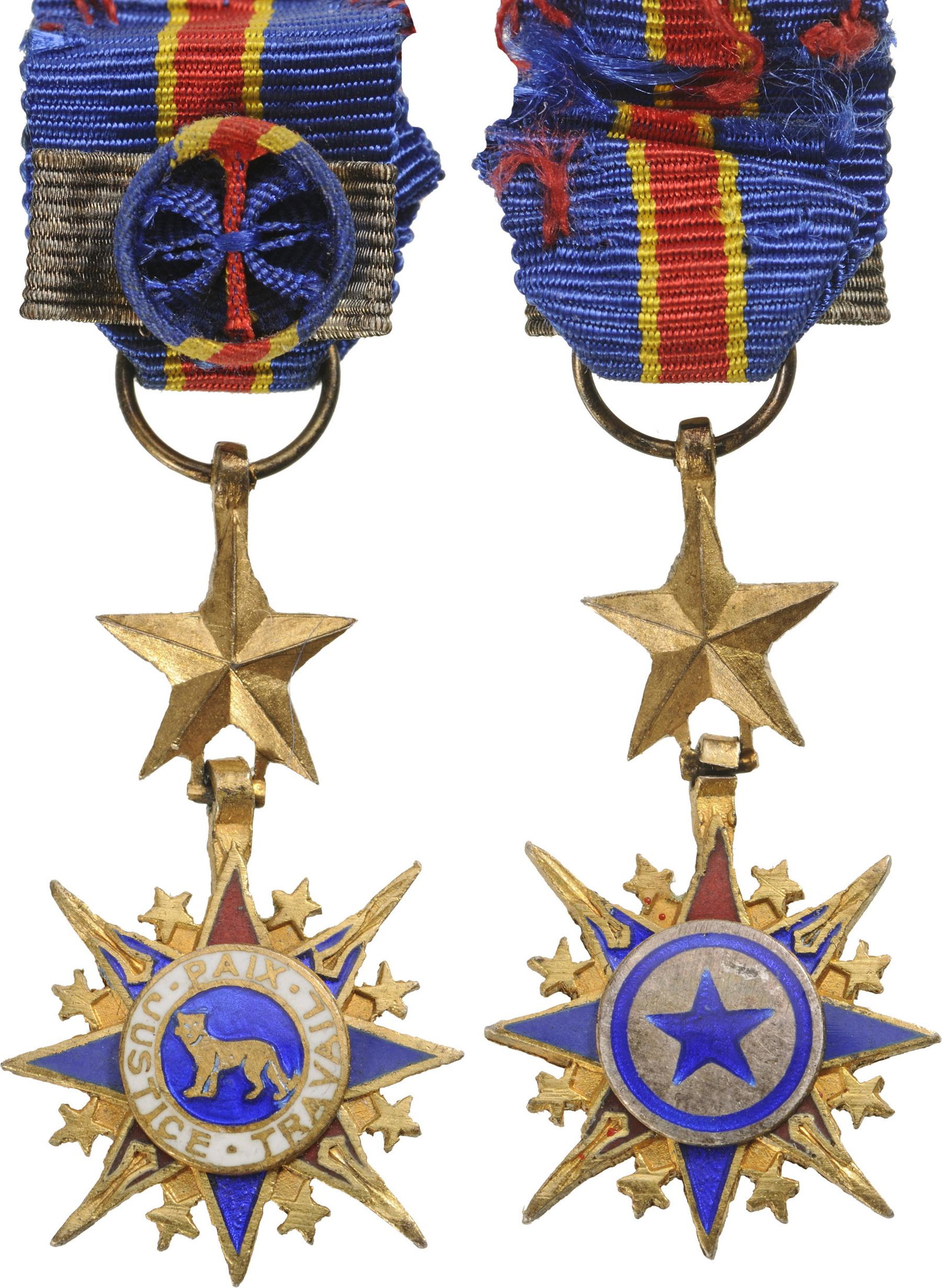 NATIONAL ORDER OF THE LEOPARD: Commander's Cross Miniature, 3rd Class, instituted in 1966. Breast Badge, 29x16 mm, gilt Bronze, central medallion enameled, original suspension ring and ribbon with rosette and sivered bar. Scarce! R