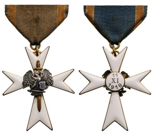 CROSS OF THE DEFENSE LEAGUE: 3rd Class Cross, instituted in 1918. Breast Badge, 45x40 mm, gilt Silver, enameled, obverse superimposed part silver enameled, original suspension ring and ribbon. Very attractive and in perfect condi