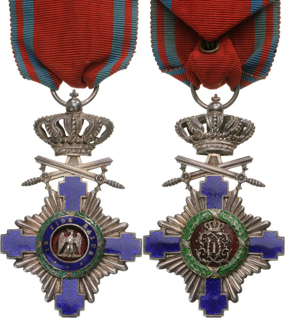 ORDER OF THE STAR OF ROMANIA, 1864: Knight 's Cross, 1st Model, for Military in Time of Peace. Breast Badge, 69x43 mm, Silver, maker's mark "Resch", both sides red enameled, obverse medallion with cipher of Carol I, reverse medallion wi