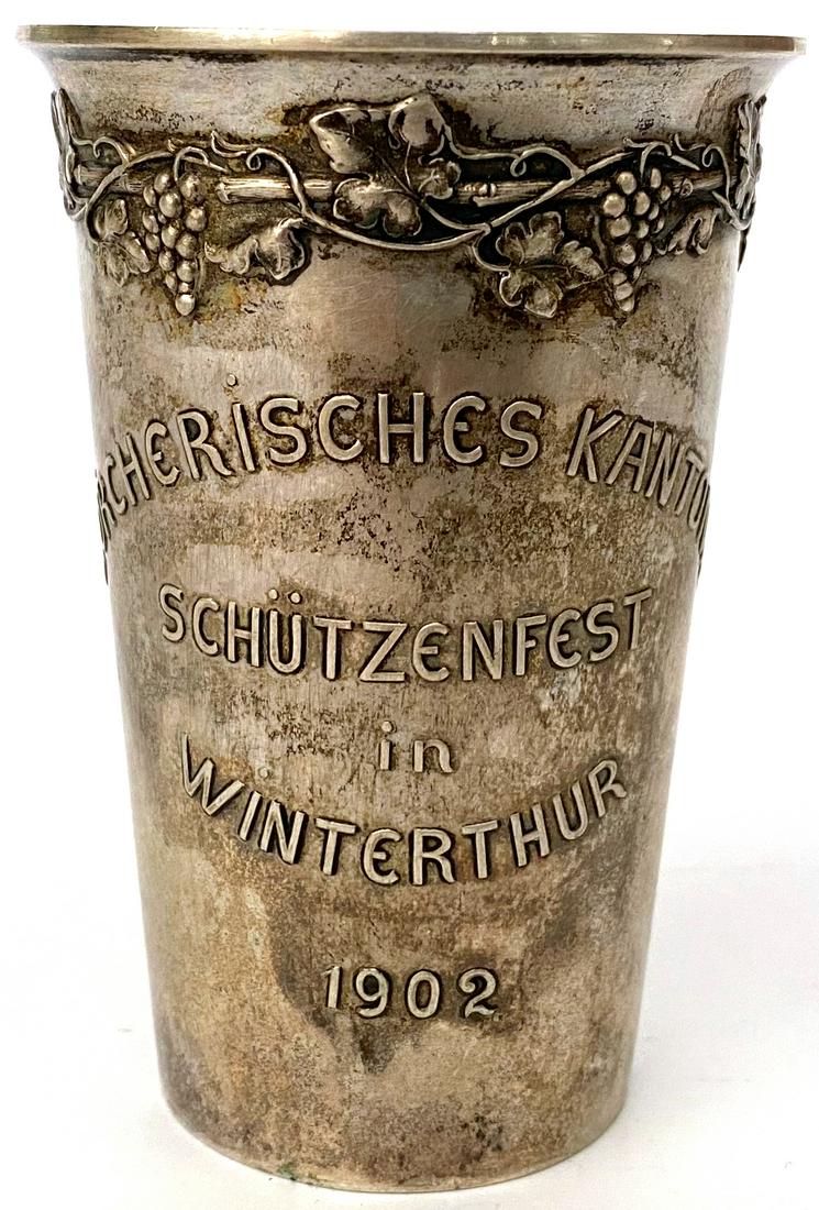 Silver Tumbler: Conical model, engraved â€œZurchericher Kantonal Schitzenfest in Wintherthur 1902â€œ (Zurich Cantonal Shooting Contest in Wintherthur 1902), hallmarked â€