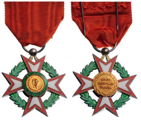 NATIONAL ORDER: Knight's Cross, 5th Class, instituted in 1961. Breast Badge, gilt Silver, 39 mm, obverse enameled, both central medallions gilt silver, obverse enameled, with original suspension ring and ribbon, make