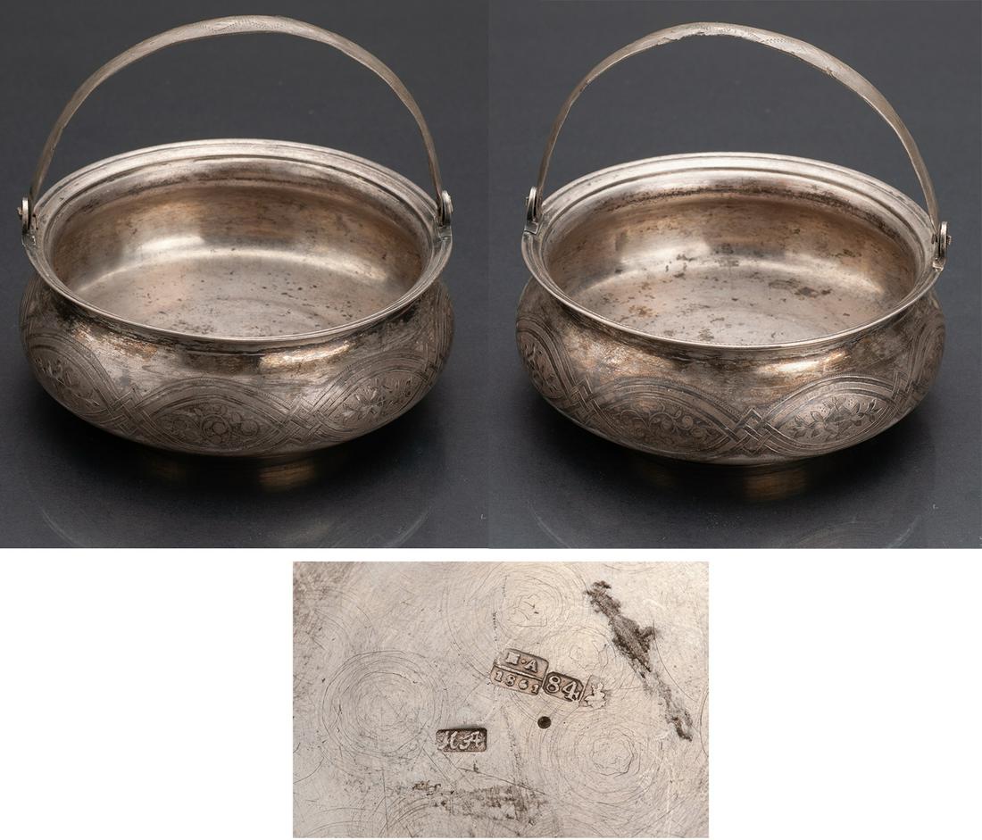 Silver and niello biscuit basket: Small foot, model with removable handle, decor engraved on the body. Weight 123 g, height 4.5 cm without the handle. Standard guarantee 84, Moscow 1861, silversmith probably M. Dmitriev, assayer Aleks