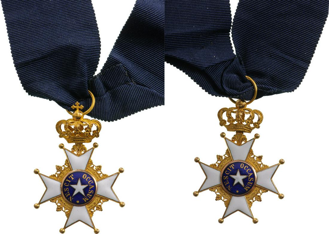 ORDER OF THE NORTHERN STAR: Knight's Cross, 5th Class, instituted in 1748. Breast Badge, 57x39 mm, GOLD, 12.1 g., both sides enameled, both central medallions GOLD, enameled, original suspension ring and long neck ribbon with go