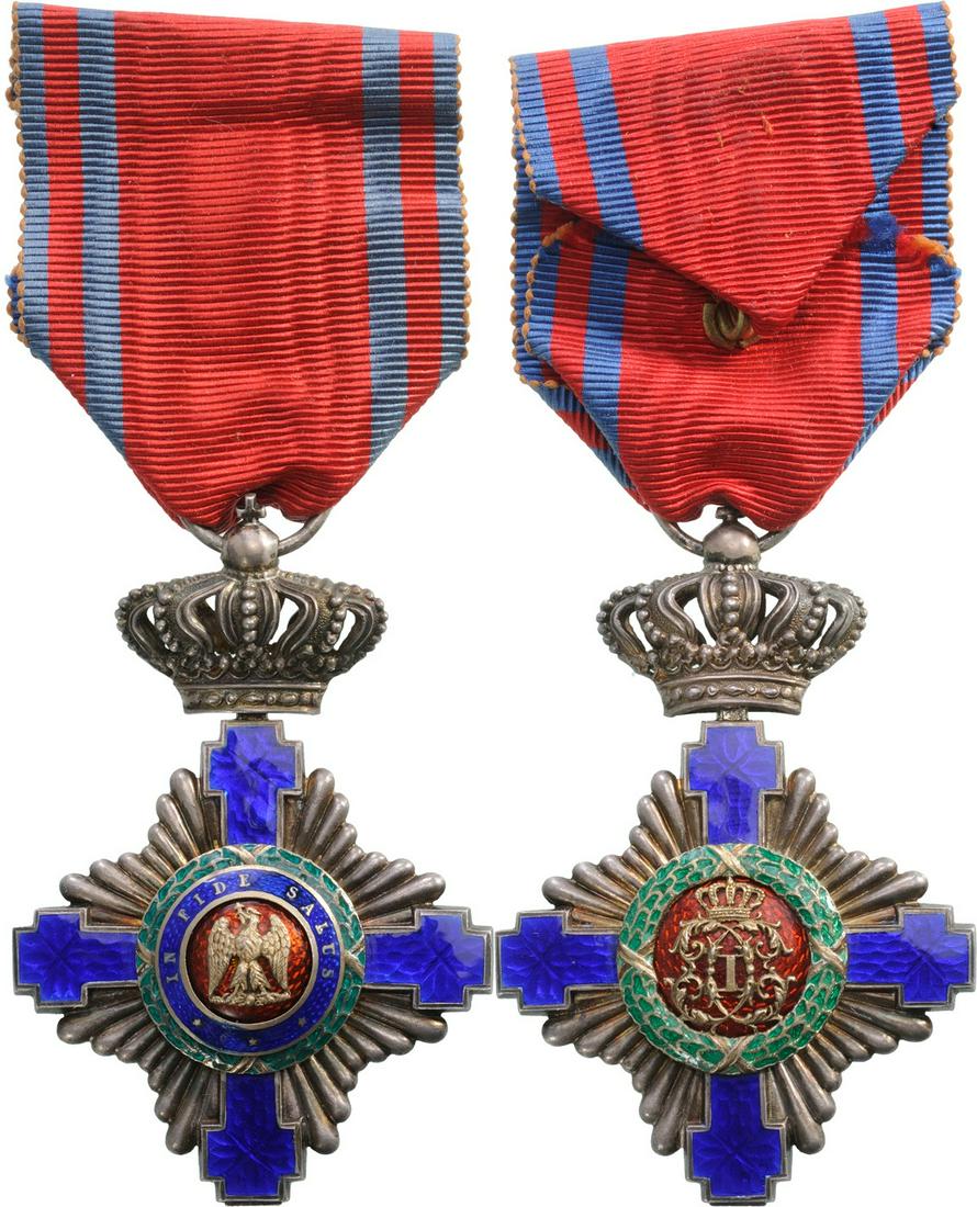 ORDER OF THE STAR OF ROMANIA, 1864: Knight 's Cross, 1st Model, for Civil. Breast Badge, 64x44 mm, Silver, maker's mark "Resch", both sides red enameled, obverse medallion with cipher of Carol I, reverse medallion with "10 Maiu", origin