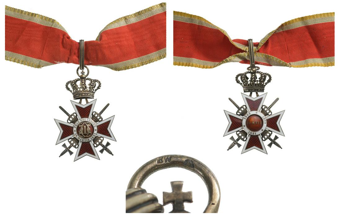ORDER OF THE CROWN OF ROMANIA, 1881: Commander 's Cross, 2nd Model (1938), for Military. Breast Badge, 76x50 mm, gilt Silver, maker`s mark "HW-crown", both sides red enameled, obverse medallion with cipher of Carol I, reverse medallion w