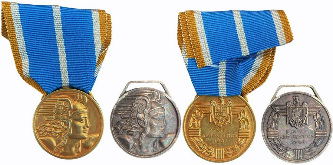 The "Aeronautical Virtue" Medal, Civil: Set 1-2 Classes. Breast Badges, 32 mm, gilt Bronze and silvered Bronze, original rings and ribbon (one missing). (2) Rare set! I R!