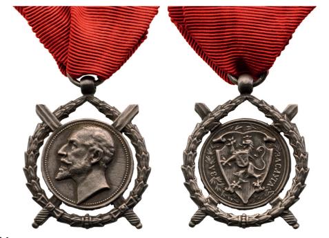 MEDAL OF MERIT: 2nd Class, 3rd Model, Ferdinand I old bust, 1891-1918, with Swords. Breast Badge, 32x30 mm, Silver, with original suspension ring and ribbon. R! II