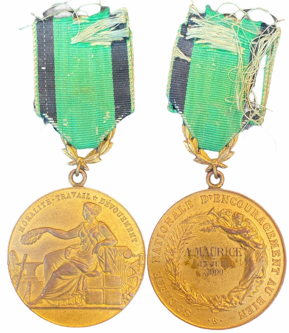 National Society of Encouragement Medal: Large Model. Breast Badge, named, 36 mm, gilt Bronze, original suspension ring and ribbon. Attractive! I-