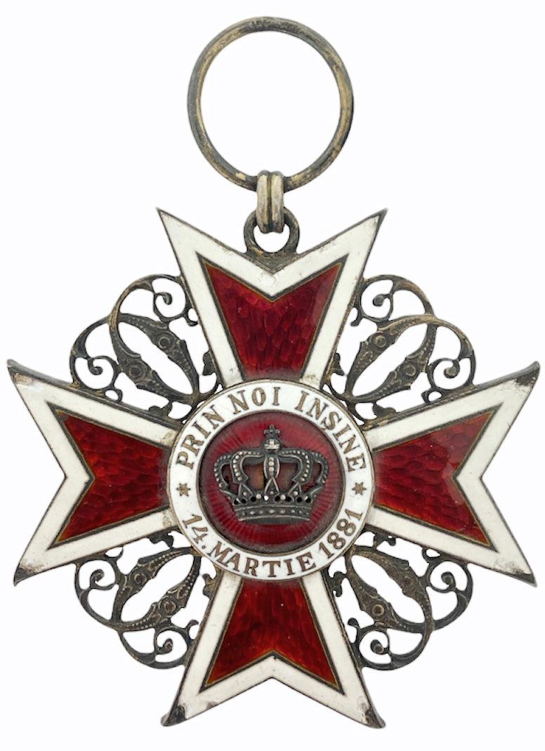 ORDER OF THE CROWN OF ROMANIA, 1881: Grand Cross Badge, 1st Type, Civil. Sash Badge, 70 mm, gilt Silver, hallmarked "ARG", maker's mark "JRF - Joseph Resch Fils", enameled (damages), reverse center missing, original suspension ring. IV