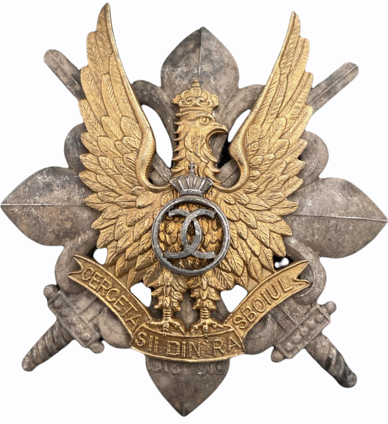 WAR BADGE OF THE SCOUTS, 1935 MODEL: 1st Model, King Carol II. Breast Badge, 58x52 mm, partially gilt Silver, make's mark "CERBU", numbered 67, with pin on reverse, I.M.S.P.R. 756. I
