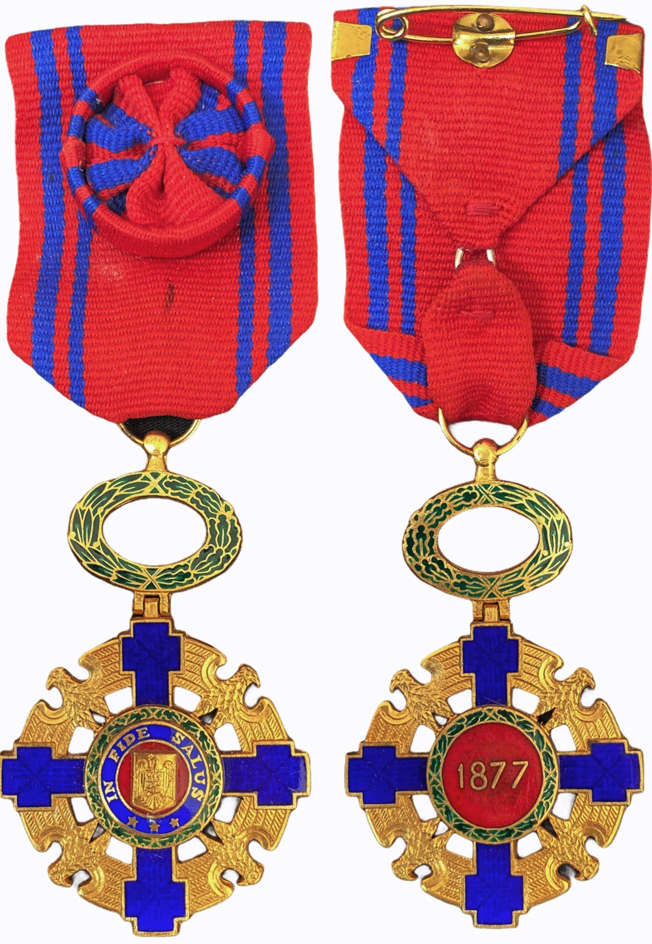 ORDER OF THE STAR OF ROMANIA: Officer`s Cross, 4th Class. Breast Badge, 65x40 mm, gilt, enameled, original suspension ring and ribbon with rosette. I