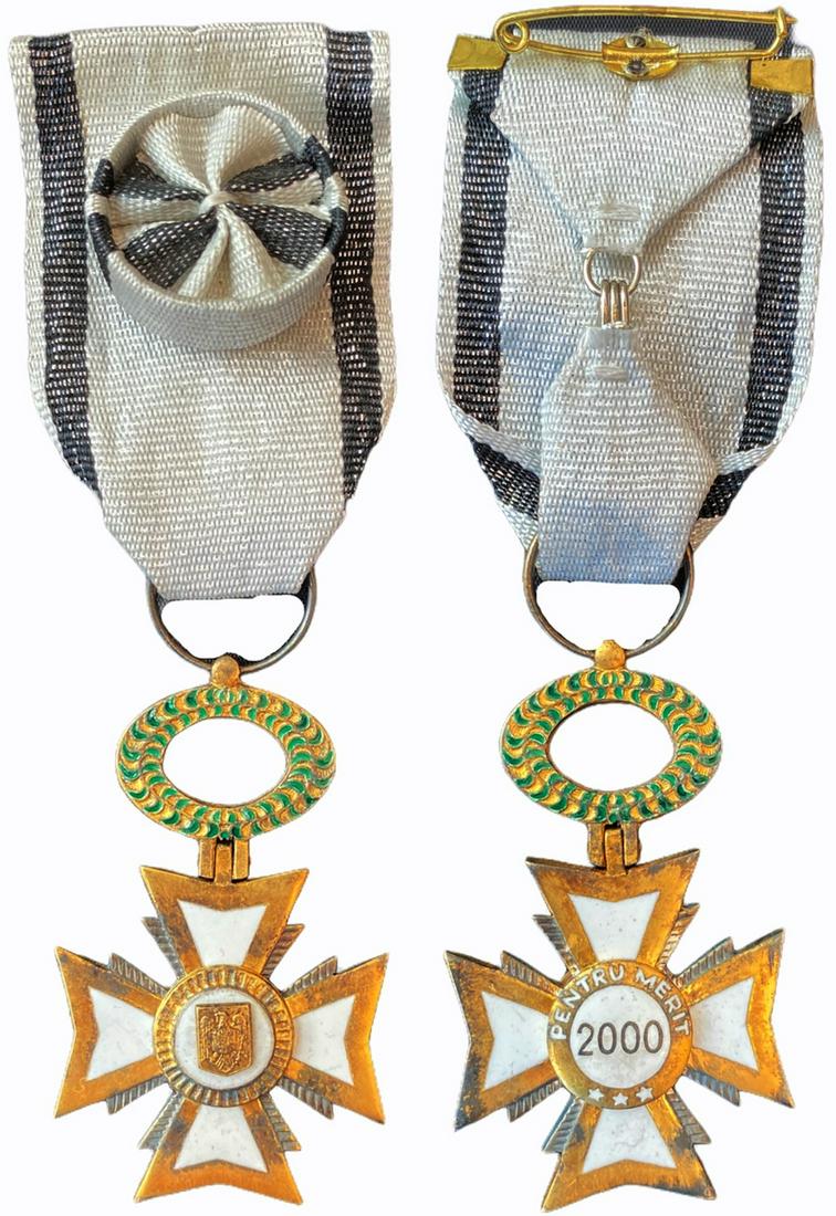 Order for Merit: Officer`s Cross, 4th Class. Breast Badge, 58x35 mm, patially enameled, original suspension device and ribbon with rosette and horizonal fixation pin. I