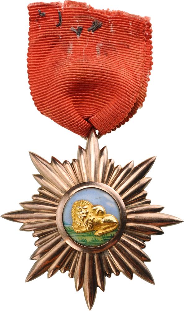 Order of Arts and Sciences: Badge of the Order with rays in red GOLD; centre medallion with enameled ground and applied, yellow gold embossed couching lion and red gold outer circlet; plain reverse with convex counter medallion;