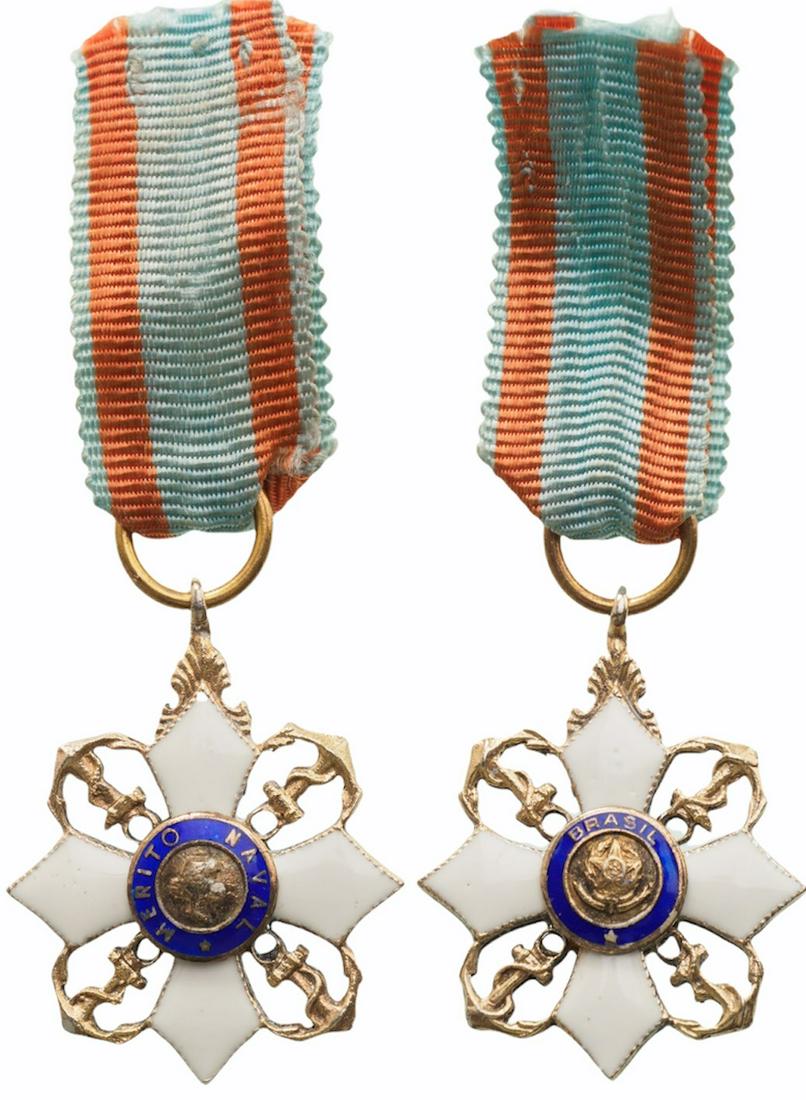 ORDER OF NAVAL MERIT: Officer's Miniature, 4th Class, instituted in 1934. Breast Badge, 30x23 mm, gilt Bronze, enameled, both central medallions gilt, enameled, original suspension ring and ribbon. Extremely fine and scarc