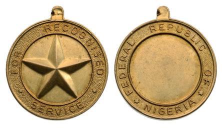 Medal for Recognized Service: Breast Badge, gilt Bronze, 36 mm, suspension ring is missing. II