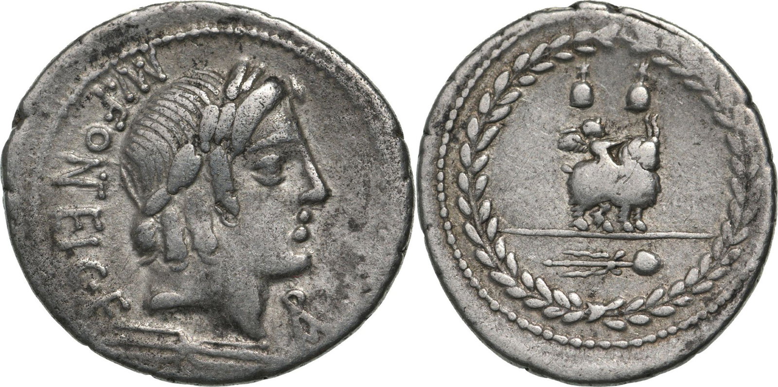 Mn. Fonteius. Denar, Silver (3.82 g) Rome, 85 BC: MN FONTEI C F Laureate head of Apollo to right, to right, monogram of ROMA, below, thunderbolt/ Cupid riding goat to right, above, two pilei surmounted by stars, below, filleted thyrsus, all within la