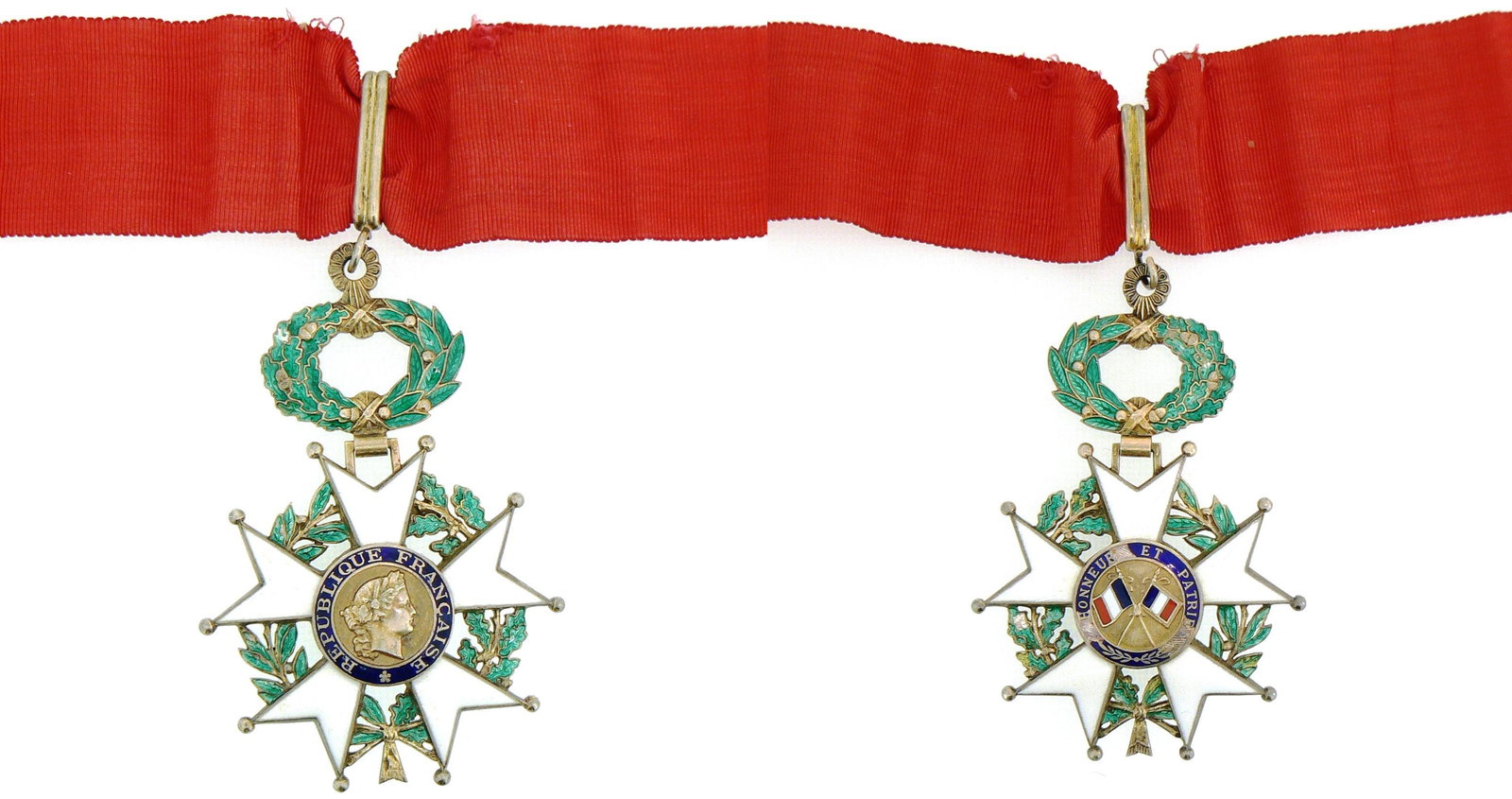 ORDER OF THE LEGION OF HONOR: Commander`s Cross, 4th Republic, instituted in 1951. Neck Badge, gilt Silver, 92x60 mm, enameled, both central medallions gilt (damages on reverse), enameled, laurel crown suspension device and neck r