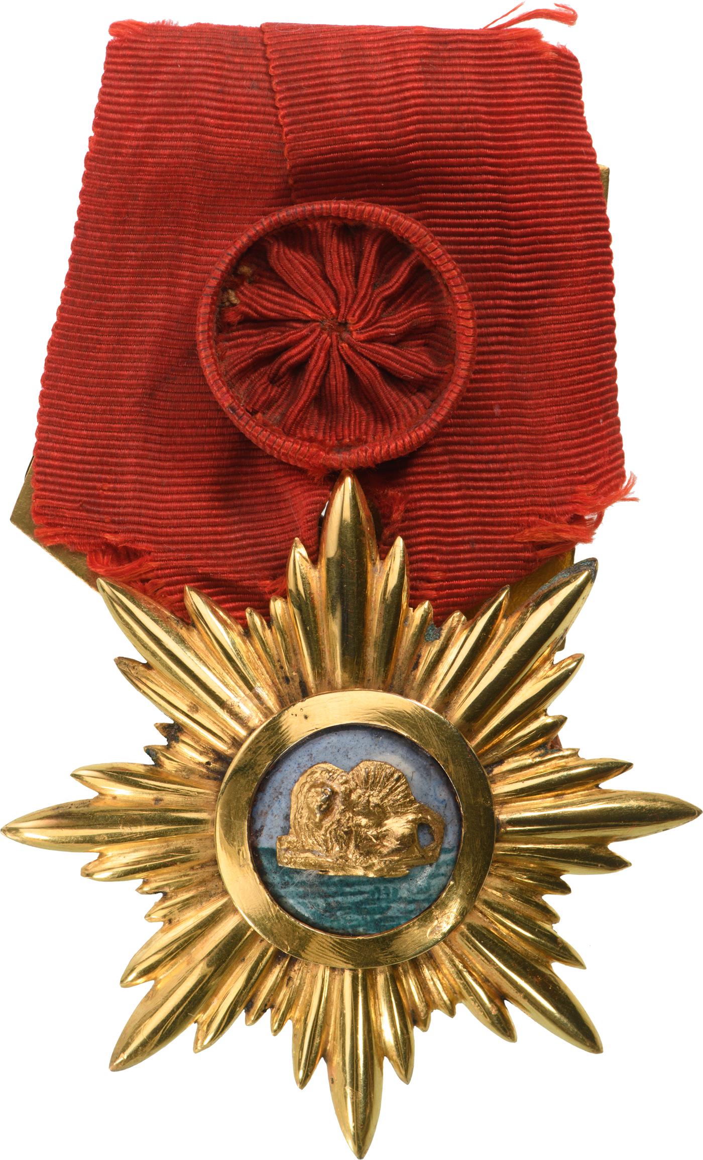 Order of Arts and Sciences: Badge of the Order, 62 mm., with rays in red gilt Bronze, Russian maker's mark and numbering, centre medallion with enameled ground and applied, yellow gold embossed couching lion and red gold outer c