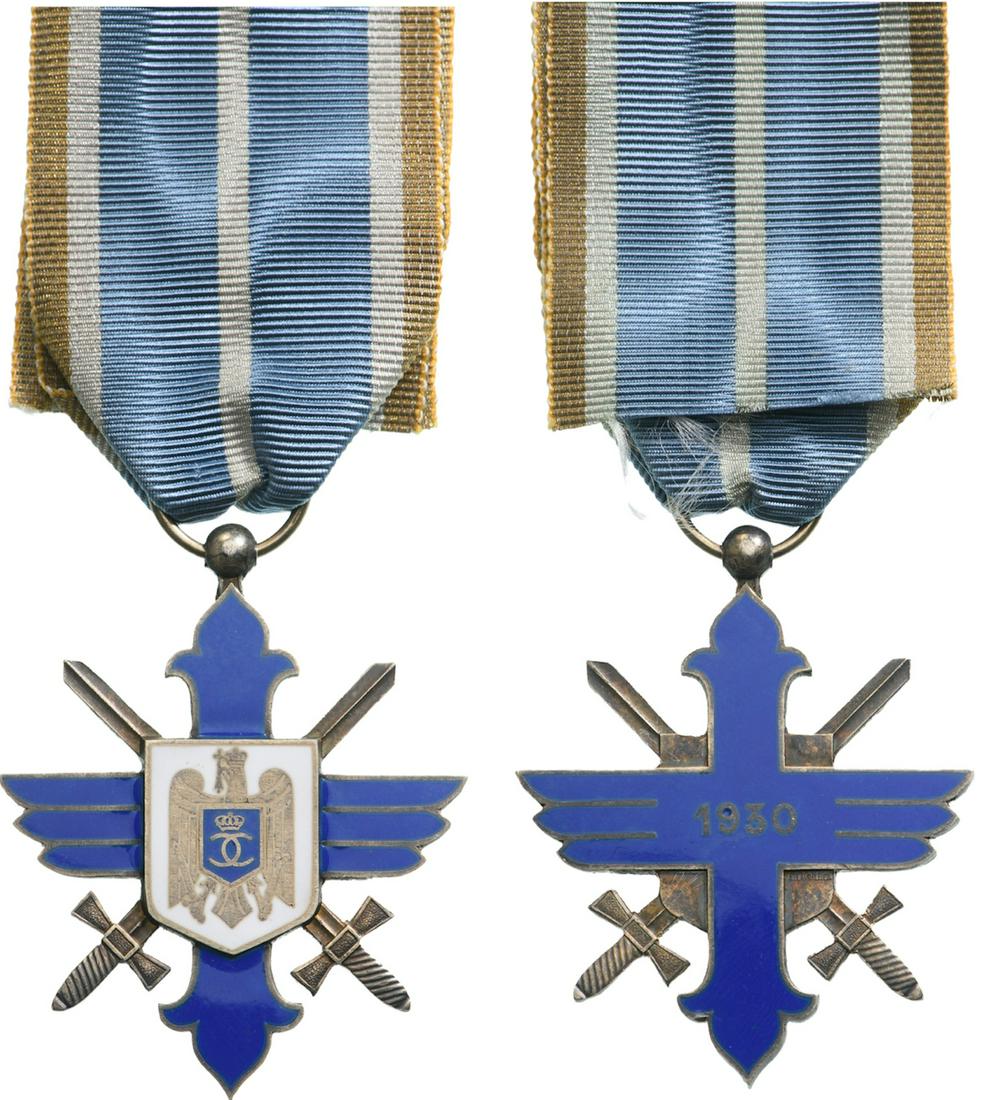 Order of Aeronautical Virtue (1930): Knight`s Cross, 1st Model with cipher of King Carol II, for Military in Time of War, 1938. Breast Badge, Silver, original suspension ring, loop and ribbon.A rare model for this order awarded to a hero