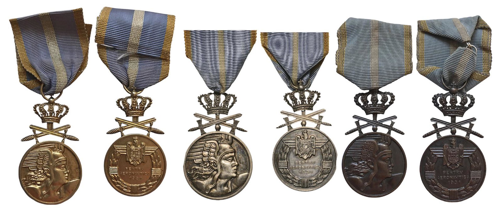 The "Aeronautical Virtue" Medal (1931): Set (1937), 1st to 3rd Class, for Military, gilt, silvered and bronze, with original suspension rings and ribbons. Rare and interesting set in extremely fine condition! Dim.: 57,0x33,0 mm. I R!