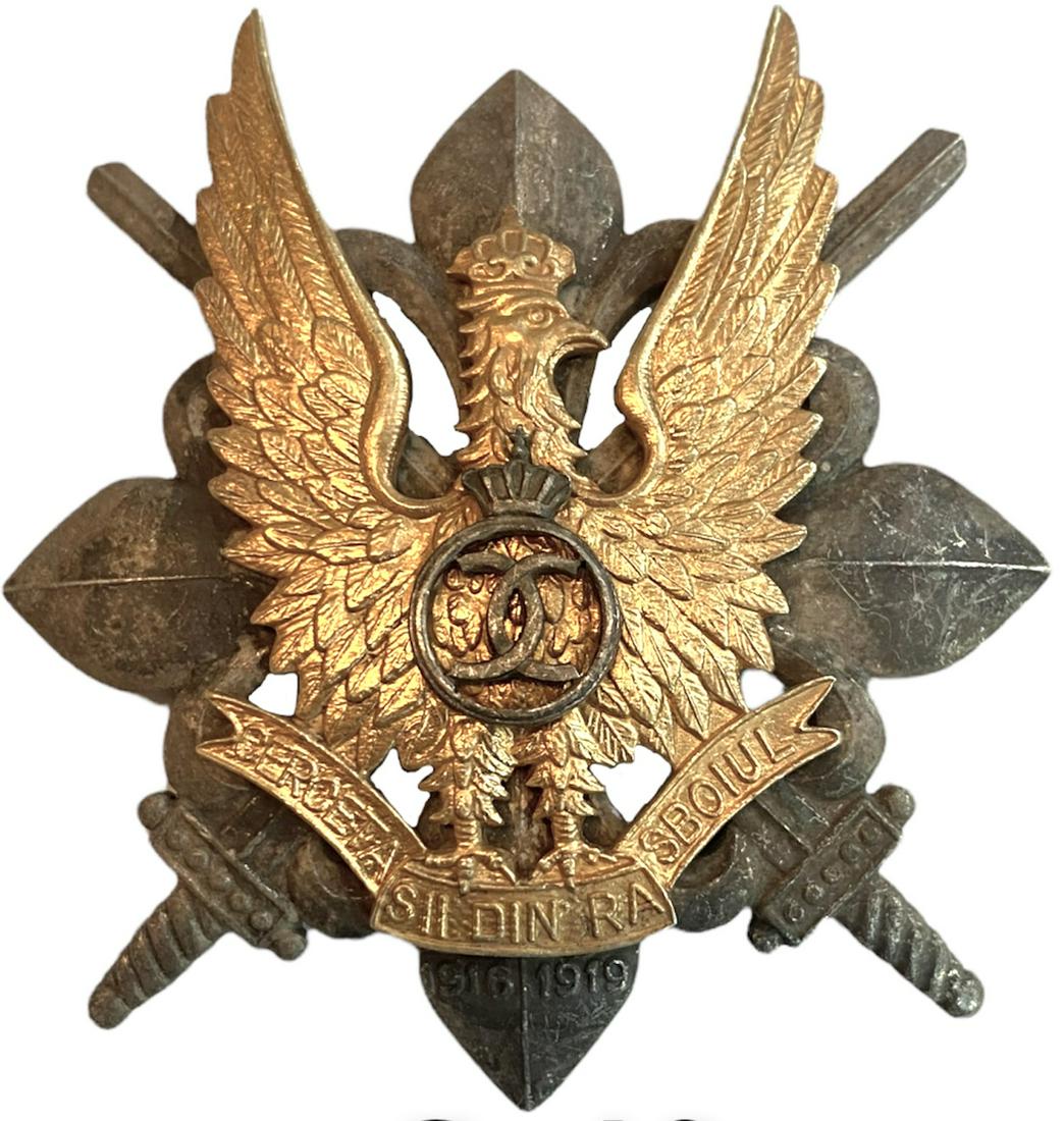 WAR BADGE OF THE SCOUTS, 1935 MODEL: 1st Model, King Carol II. Breast Badge, 58x52 mm, partially gilt Silver, make's mark "CERBU", numbered 121, with pin on reverse, I.M.S.P.R. 756. I