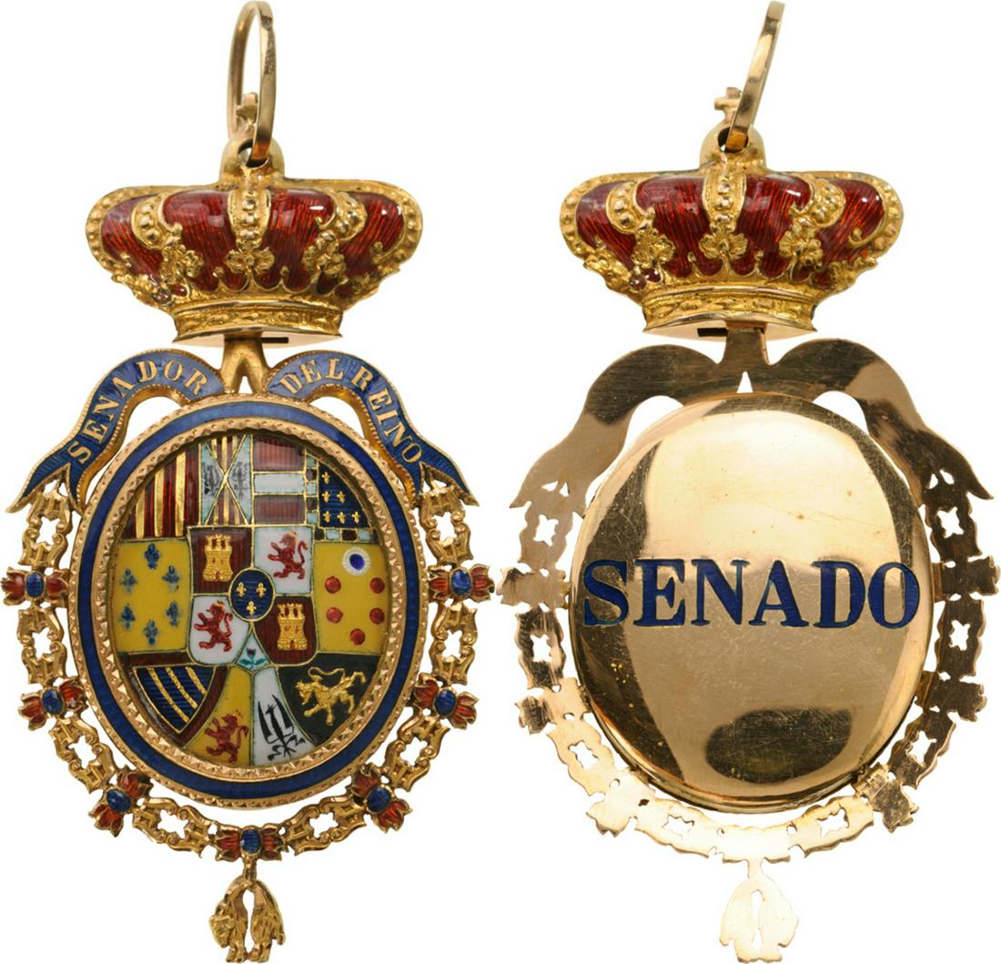Insignia of Member of the Senate: Gold Insignia of Member of the Senate, 49x40 mm, oval, with the coat-of-arms of Spain, within blue-filleted frame of gold with chiseled details, the whole, enclosed within the collar of the Order of t